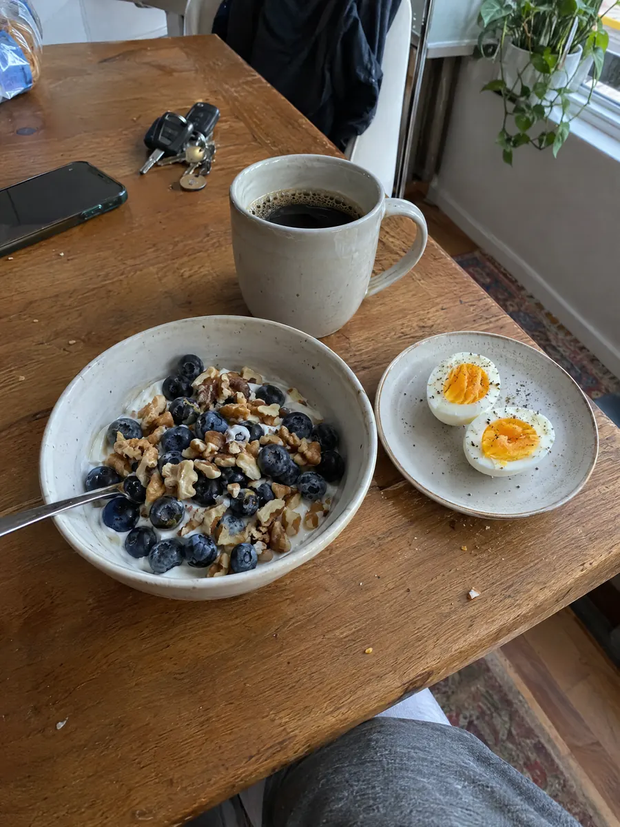 Greek yogurt with blueberries and boiled eggs